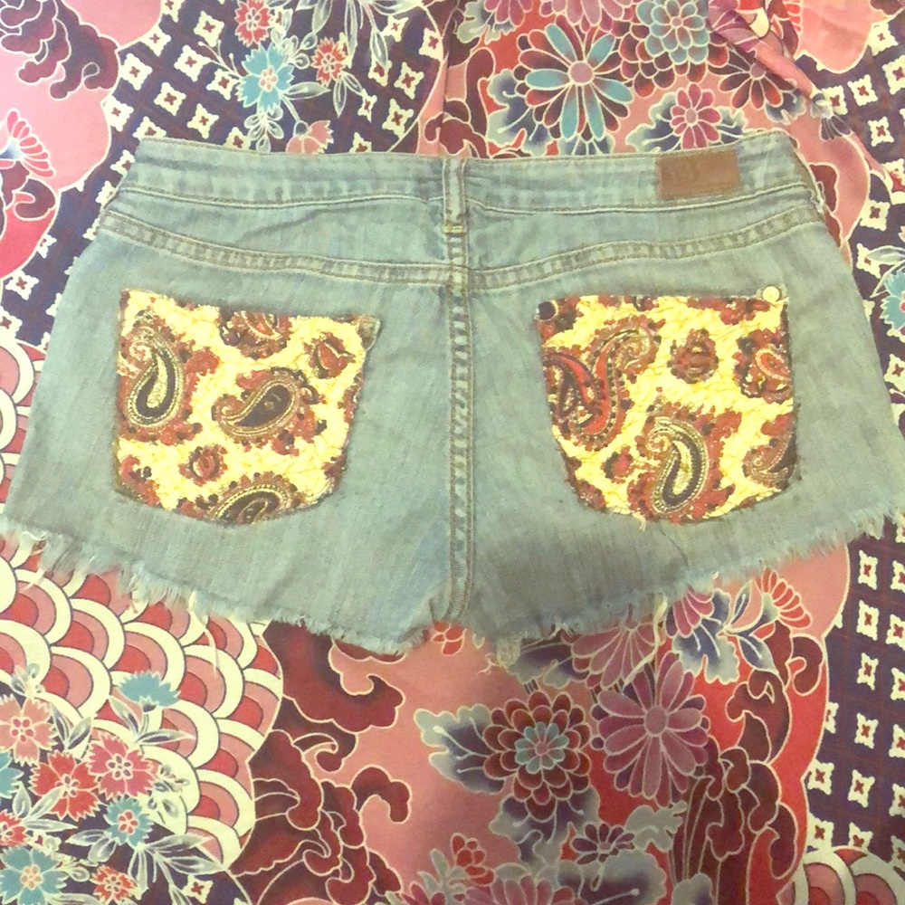 Jeans with paisley print cut outs hand 🧵 sewing